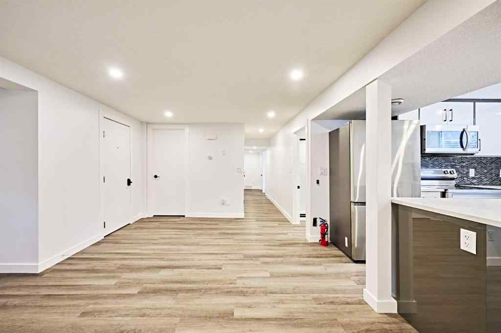 MLS® A2239567 - 77 Hartford Road NW in Highwood Calgary, Residential