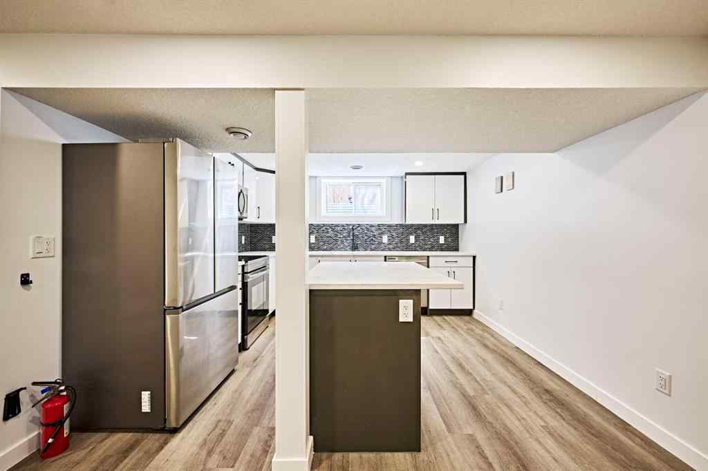 MLS® A2239567 - 77 Hartford Road NW in Highwood Calgary, Residential