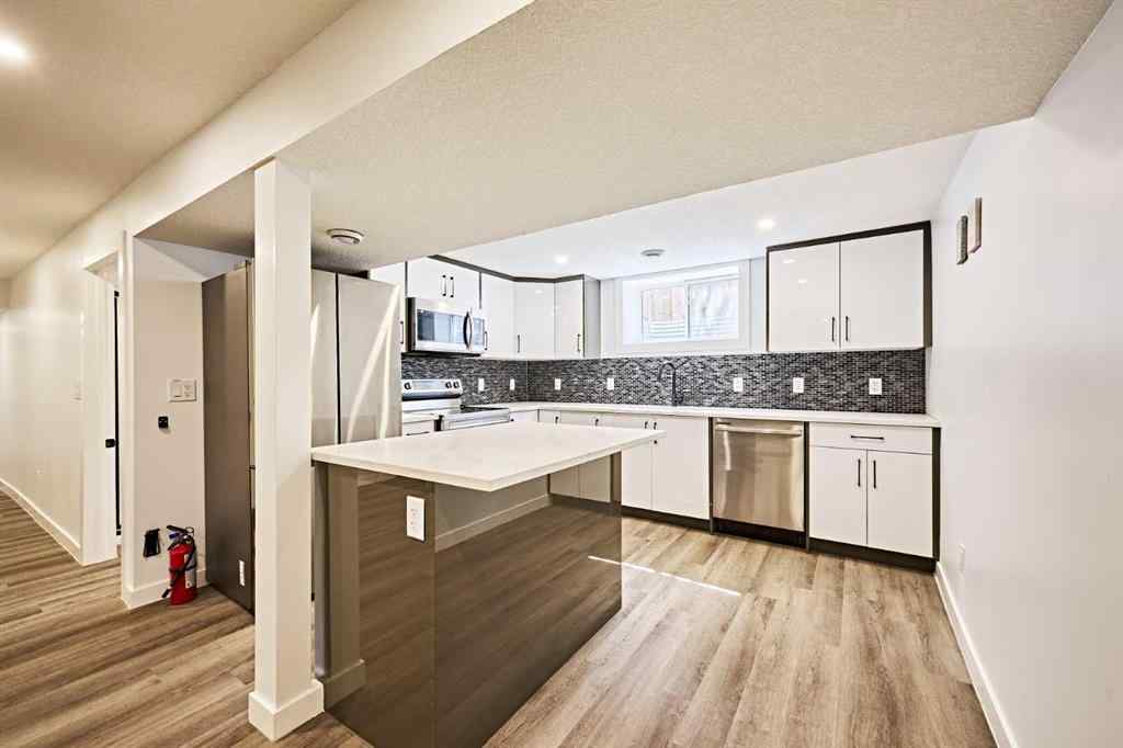 MLS® A2239567 - 77 Hartford Road NW in Highwood Calgary, Residential