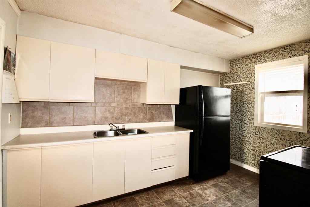MLS® A2239570 - 9509 102 Street  in Swanavon Grande Prairie, Residential