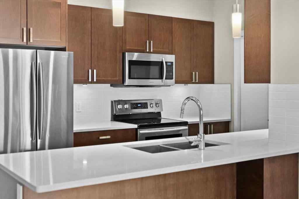 MLS® A2239615 - Unit #306 22 Auburn Bay Link SE in Auburn Bay Calgary, Residential