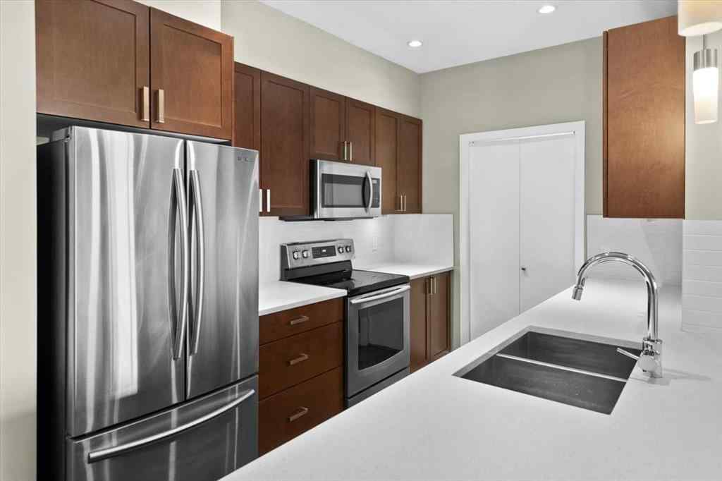 MLS® A2239615 - Unit #306 22 Auburn Bay Link SE in Auburn Bay Calgary, Residential