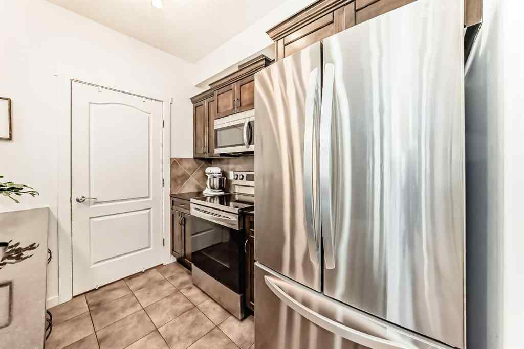 MLS® A2239617 - Unit #208 141 Mountain Street  in East End Cochrane, Residential