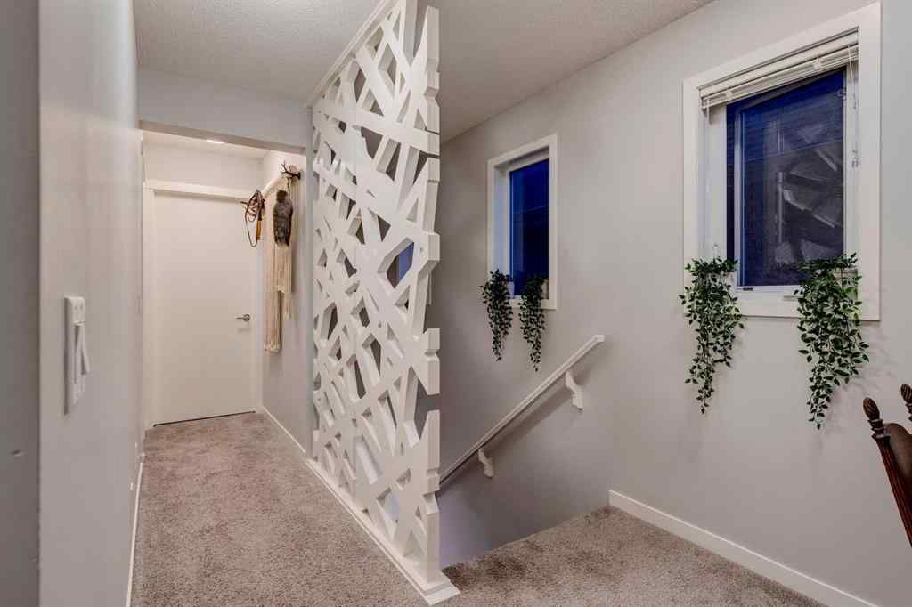 MLS® A2239718 - 205 Copperpond Parade SE in Copperfield Calgary, Residential