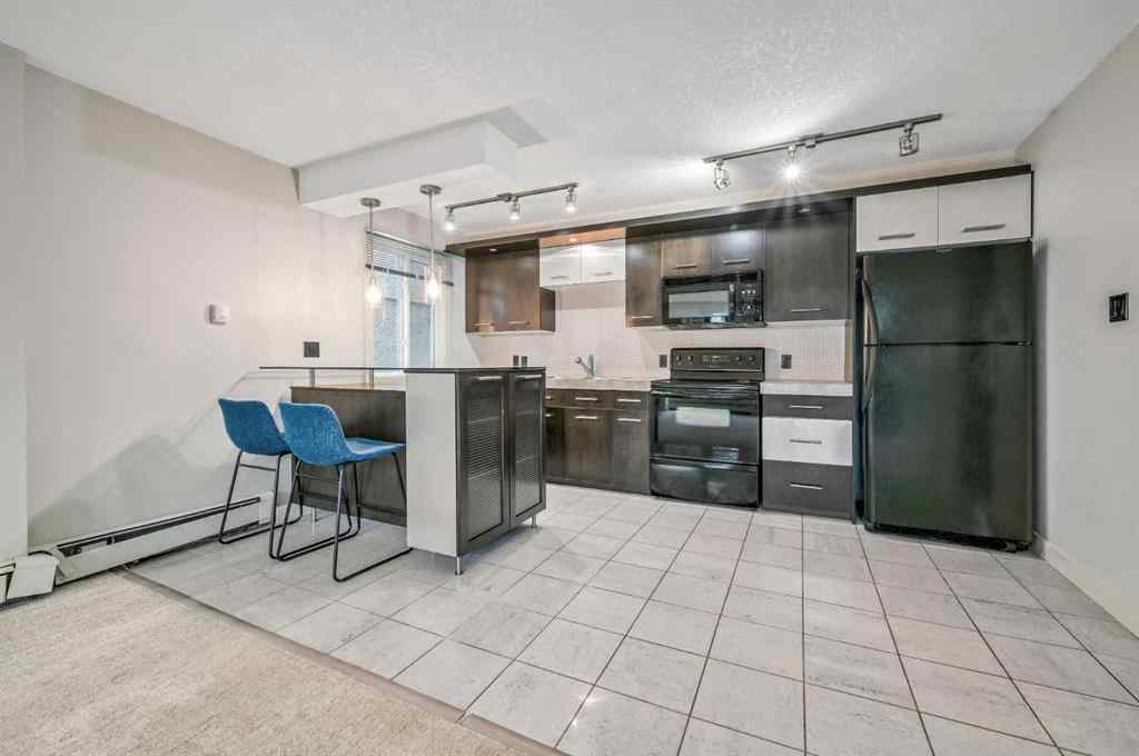 MLS® A2239750 - Unit #205 324 22 Avenue SW in Mission Calgary, Residential