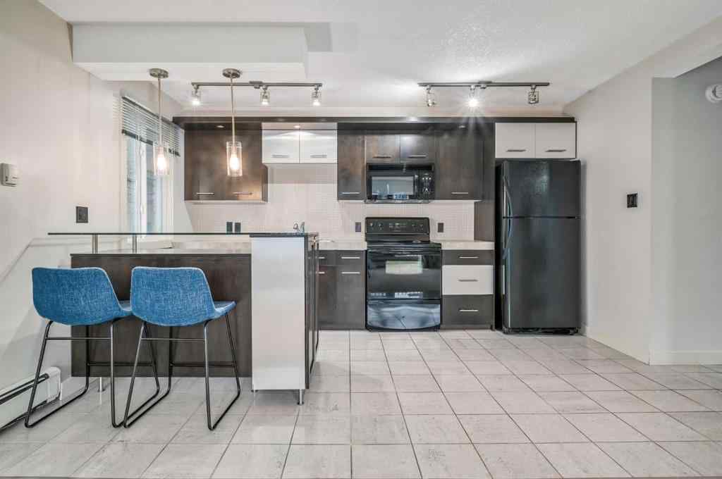 MLS® A2239750 - Unit #205 324 22 Avenue SW in Mission Calgary, Residential