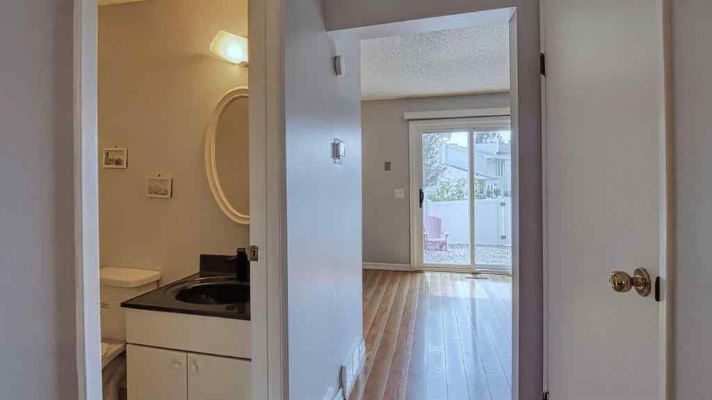 MLS® A2239756 - 123 Woodsman Lane SW in Woodbine Calgary, Residential