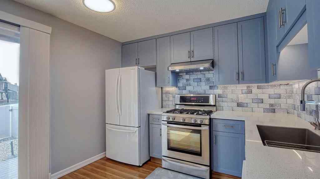MLS® A2239756 - 123 Woodsman Lane SW in Woodbine Calgary, Residential