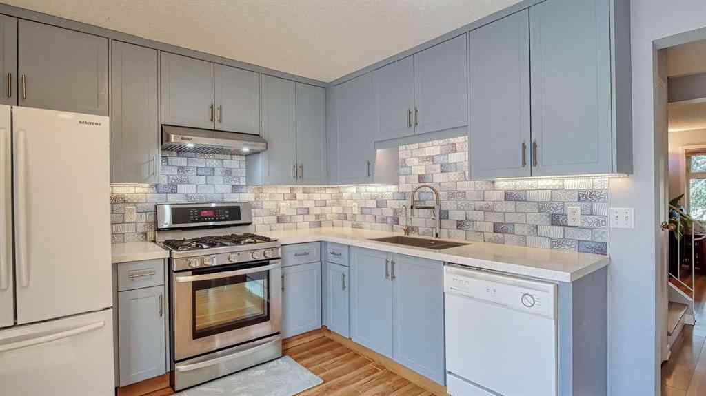 MLS® A2239756 - 123 Woodsman Lane SW in Woodbine Calgary, Residential
