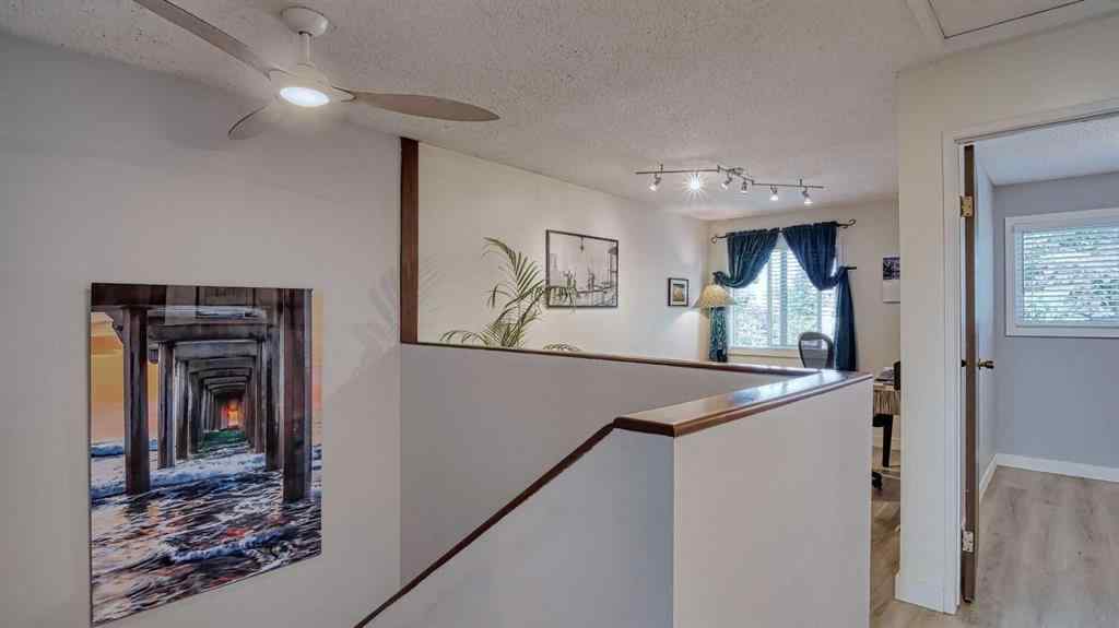 MLS® A2239756 - 123 Woodsman Lane SW in Woodbine Calgary, Residential