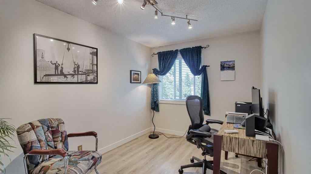 MLS® A2239756 - 123 Woodsman Lane SW in Woodbine Calgary, Residential