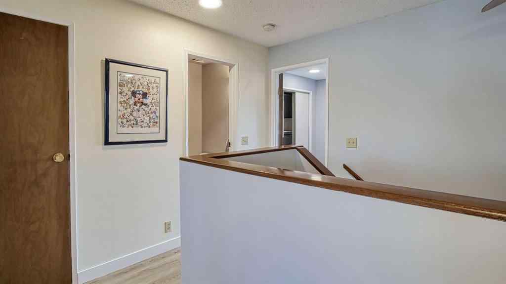 MLS® A2239756 - 123 Woodsman Lane SW in Woodbine Calgary, Residential