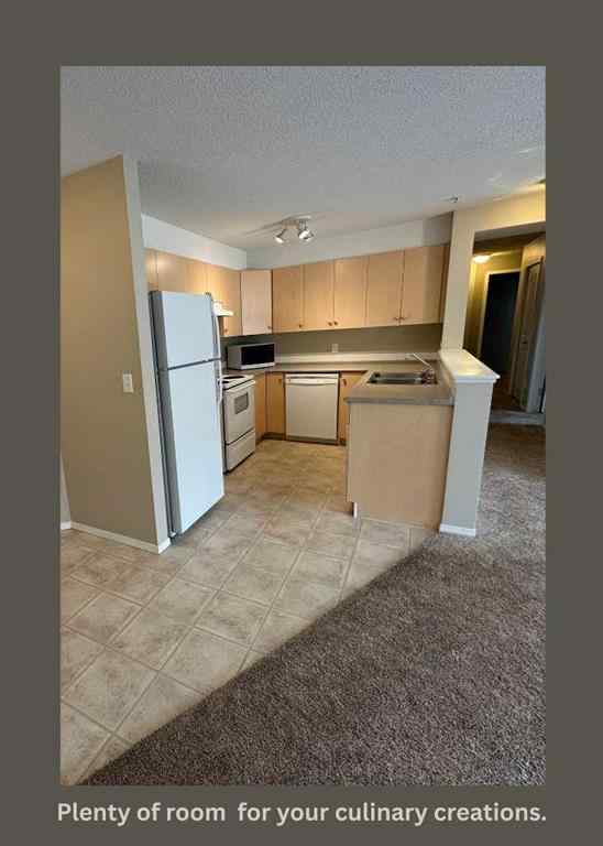 MLS® A2239763 - Unit #2214 505 Railway Street W in Downtown Cochrane, Residential