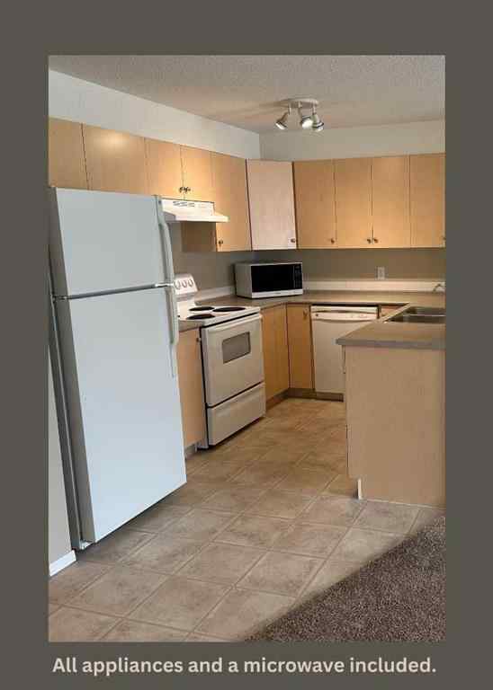 MLS® A2239763 - Unit #2214 505 Railway Street W in Downtown Cochrane, Residential