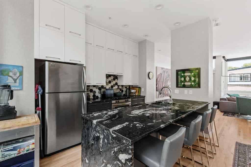 MLS® A2239808 - Unit #105 1720 12 Street SW in Lower Mount Royal Calgary, Residential