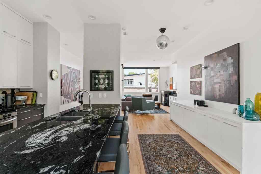 MLS® A2239808 - Unit #105 1720 12 Street SW in Lower Mount Royal Calgary, Residential