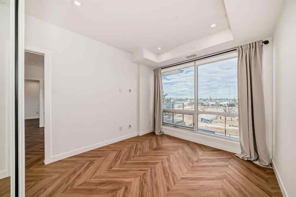 MLS® A2239836 - Unit #313 8445 Broadcast Avenue SW in West Springs Calgary, Residential