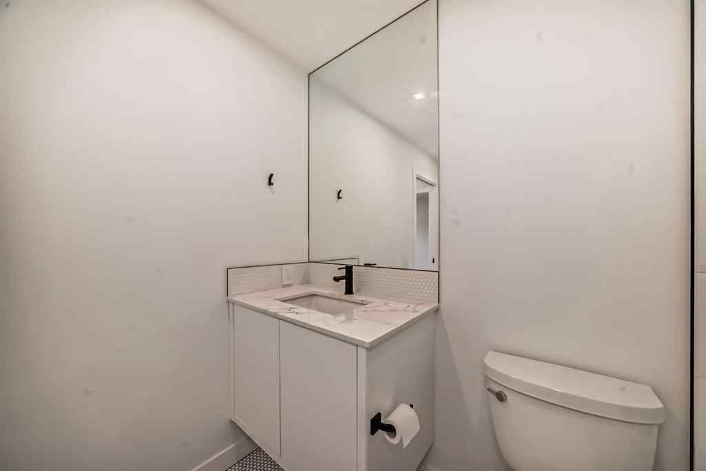 MLS® A2239836 - Unit #313 8445 Broadcast Avenue SW in West Springs Calgary, Residential