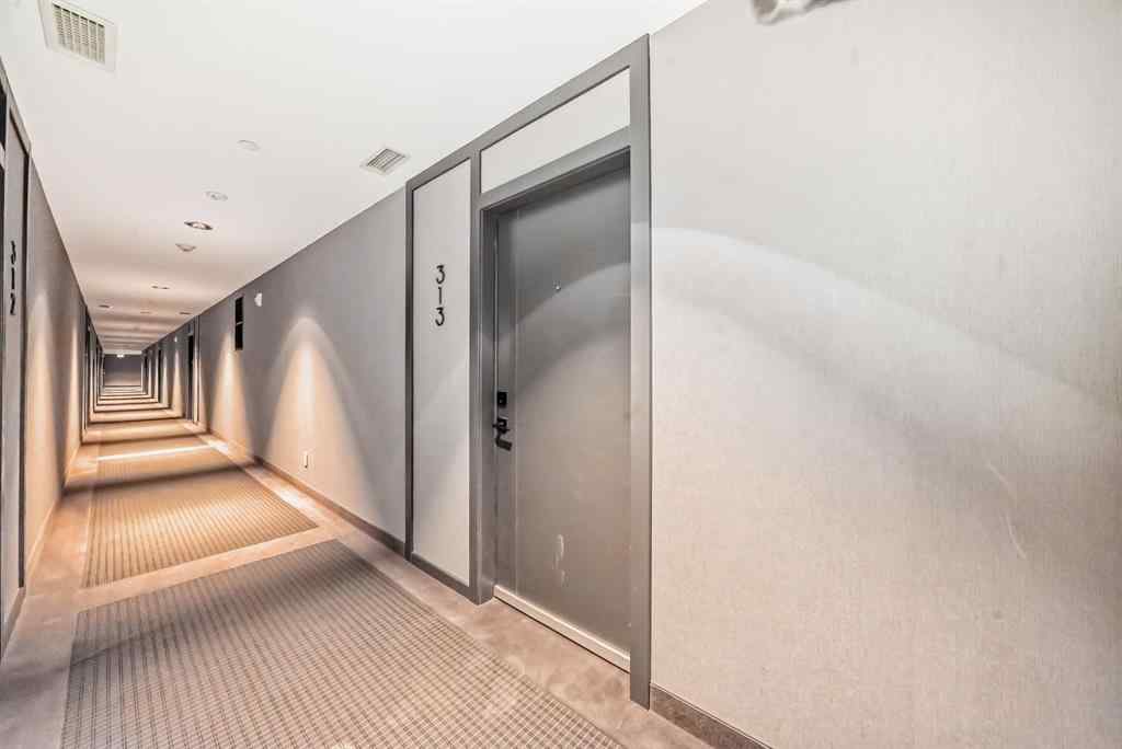 MLS® A2239836 - Unit #313 8445 Broadcast Avenue SW in West Springs Calgary, Residential