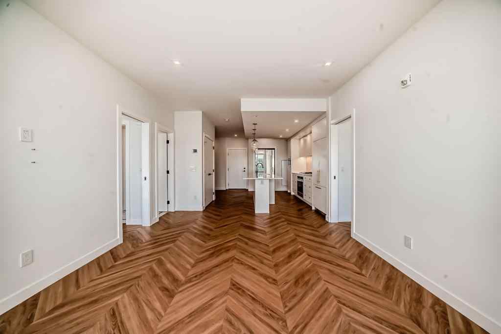 MLS® A2239836 - Unit #313 8445 Broadcast Avenue SW in West Springs Calgary, Residential