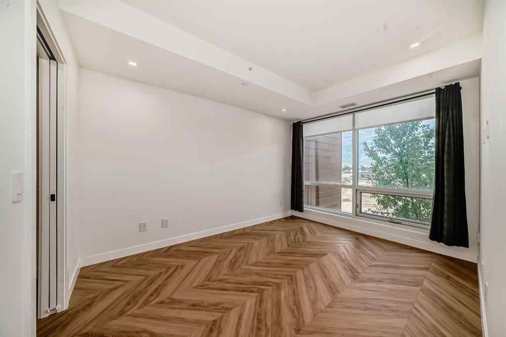 MLS® A2239836 - Unit #313 8445 Broadcast Avenue SW in West Springs Calgary, Residential