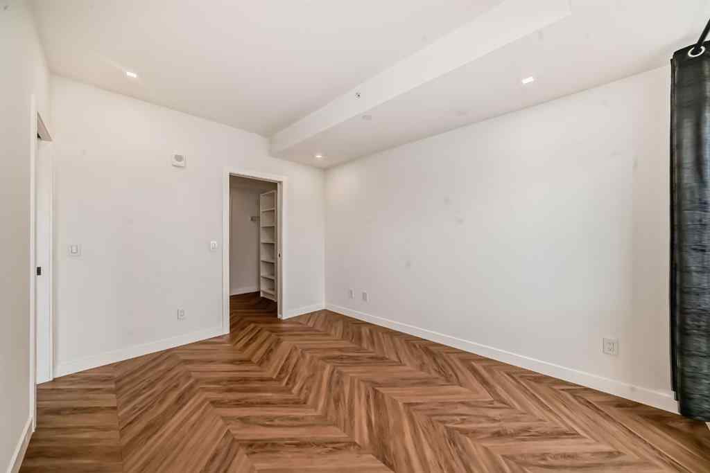 MLS® A2239836 - Unit #313 8445 Broadcast Avenue SW in West Springs Calgary, Residential