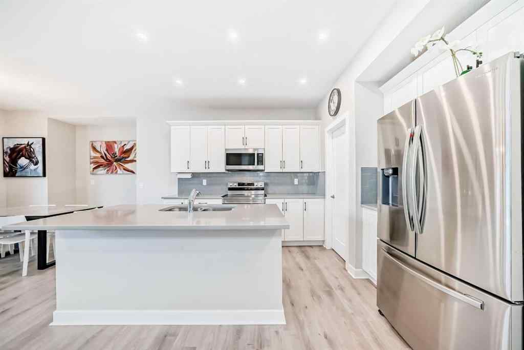 MLS® A2239853 - 820 Hampshire Crescent NE in Hampton Hills High River, Residential