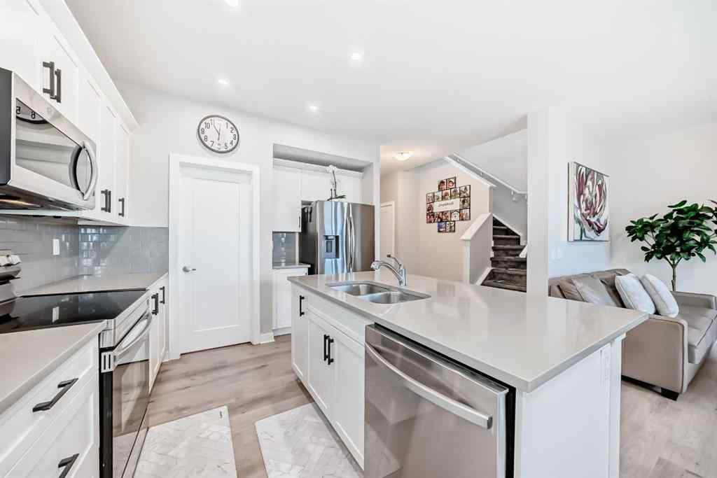 MLS® A2239853 - 820 Hampshire Crescent NE in Hampton Hills High River, Residential