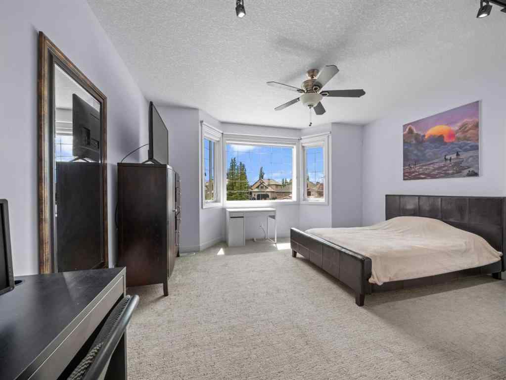 MLS® A2239886 - 210 Evergreen Mews SW in Evergreen Calgary, Residential