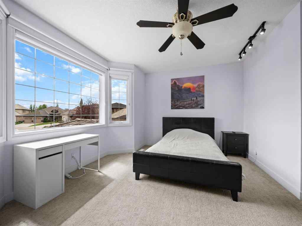 MLS® A2239886 - 210 Evergreen Mews SW in Evergreen Calgary, Residential