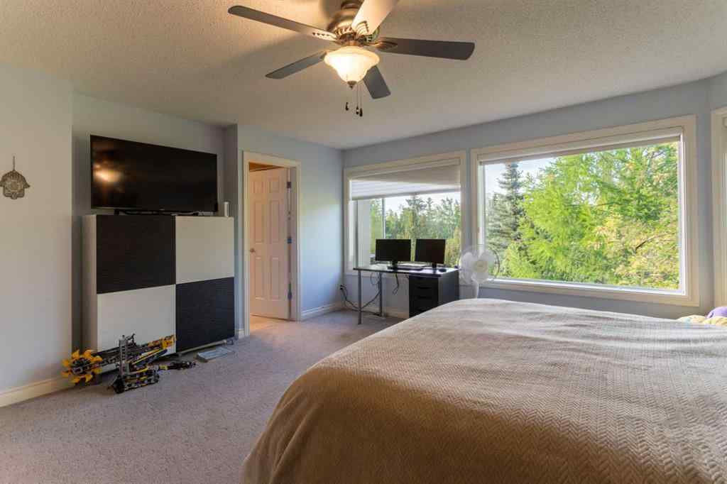 MLS® A2239886 - 210 Evergreen Mews SW in Evergreen Calgary, Residential