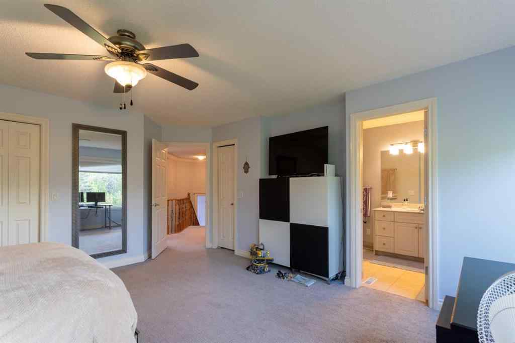 MLS® A2239886 - 210 Evergreen Mews SW in Evergreen Calgary, Residential