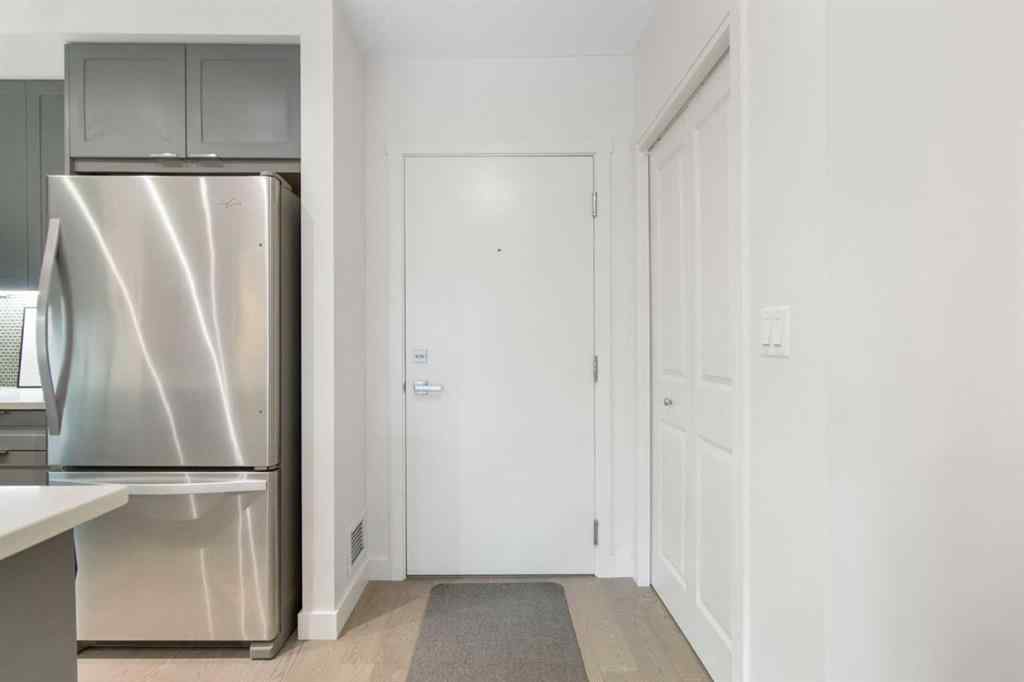 MLS® A2239976 - Unit #128 25 Auburn Meadows Avenue SE in Auburn Bay Calgary, Residential