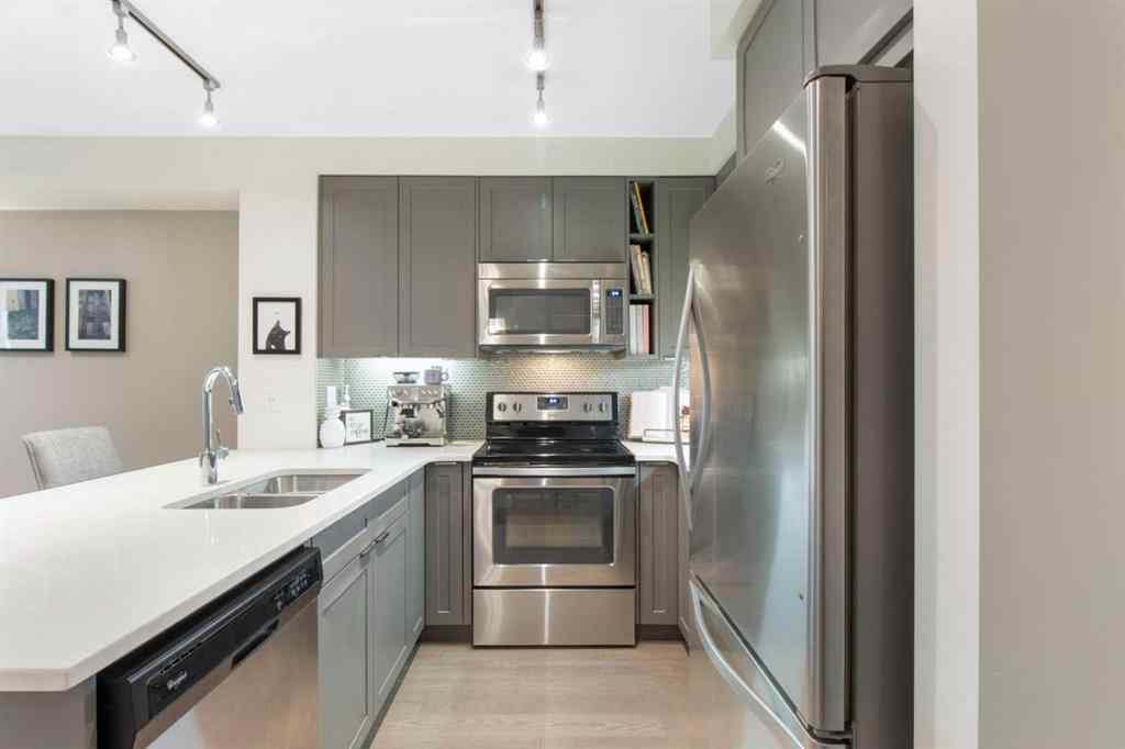 MLS® A2239976 - Unit #128 25 Auburn Meadows Avenue SE in Auburn Bay Calgary, Residential