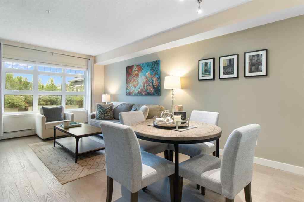 MLS® A2239976 - Unit #128 25 Auburn Meadows Avenue SE in Auburn Bay Calgary, Residential
