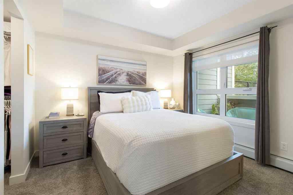MLS® A2239976 - Unit #128 25 Auburn Meadows Avenue SE in Auburn Bay Calgary, Residential