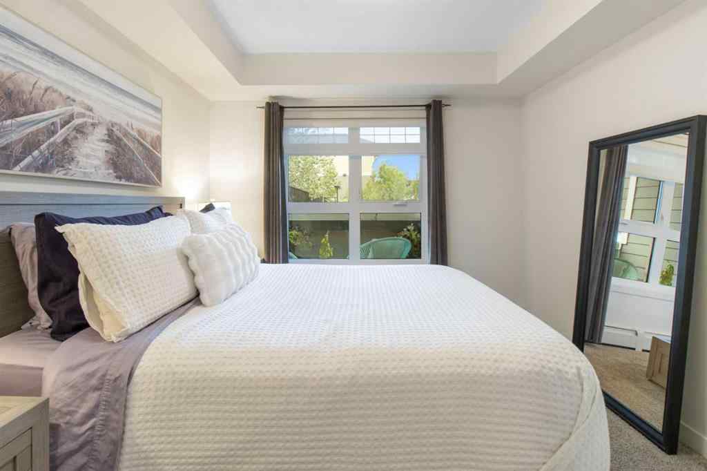 MLS® A2239976 - Unit #128 25 Auburn Meadows Avenue SE in Auburn Bay Calgary, Residential
