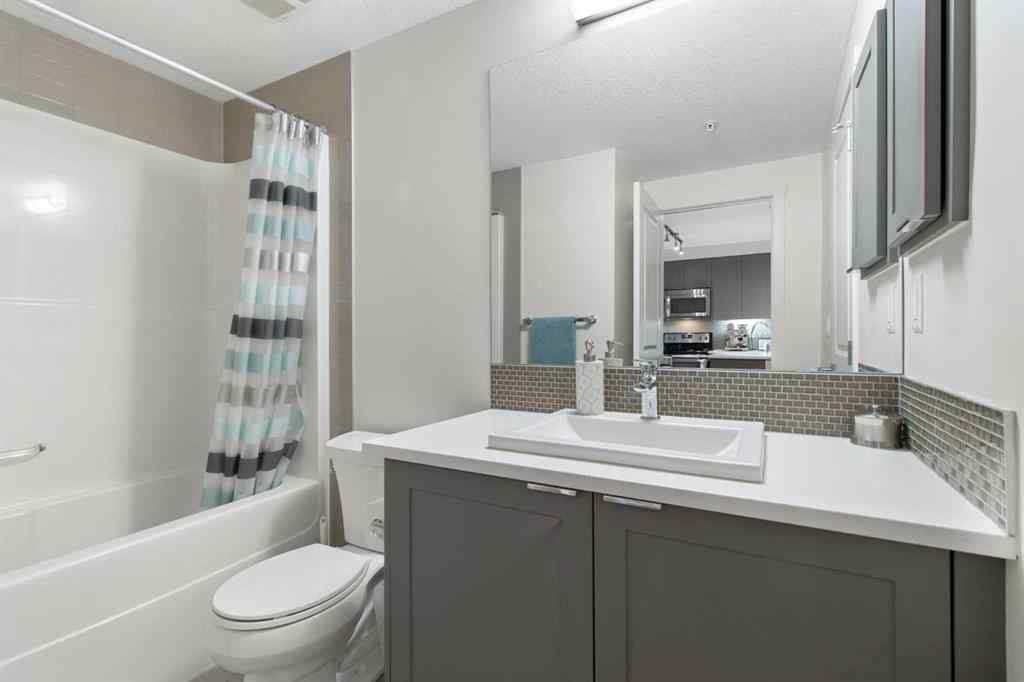 MLS® A2239976 - Unit #128 25 Auburn Meadows Avenue SE in Auburn Bay Calgary, Residential