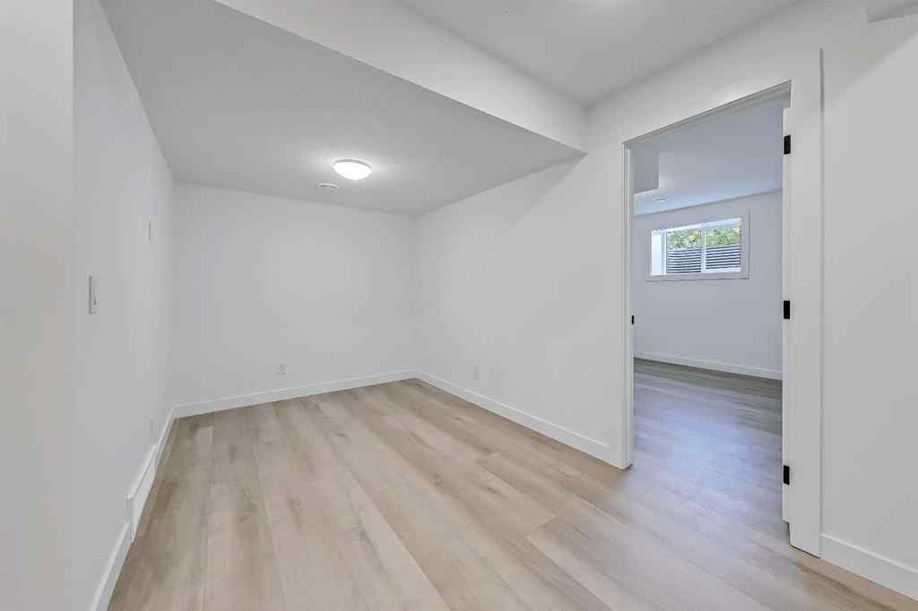 MLS® A2239987 - 641 & 639 69 Avenue SW in Kingsland Calgary, Multi-Family