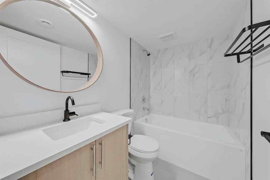 MLS® A2239987 - 641 & 639 69 Avenue SW in Kingsland Calgary, Multi-Family