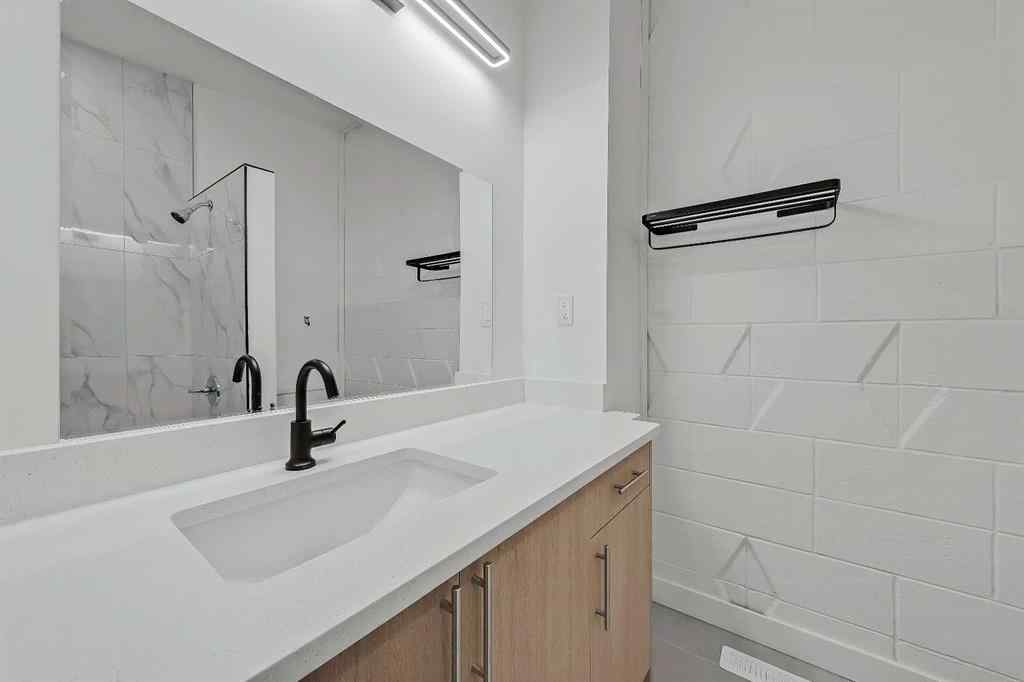 MLS® A2239987 - 641 & 639 69 Avenue SW in Kingsland Calgary, Multi-Family