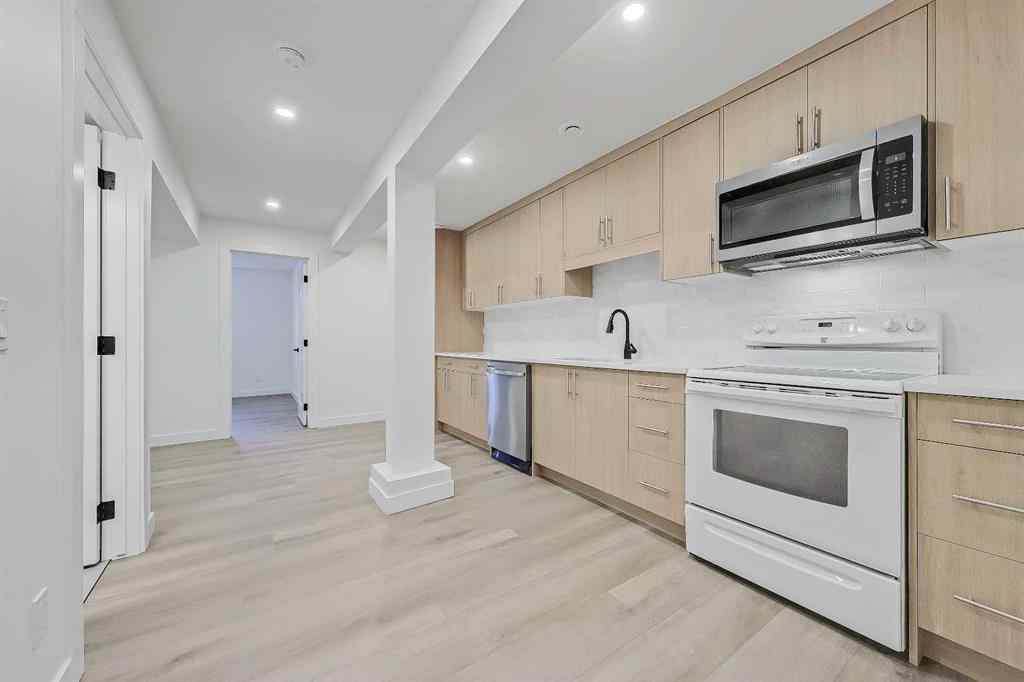 MLS® A2239987 - 641 & 639 69 Avenue SW in Kingsland Calgary, Multi-Family