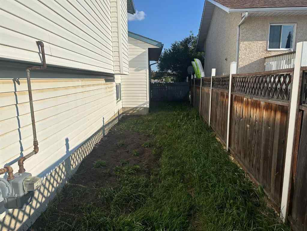 MLS® A2239988 - 9412 82 Avenue  in Patterson Place Grande Prairie, Residential