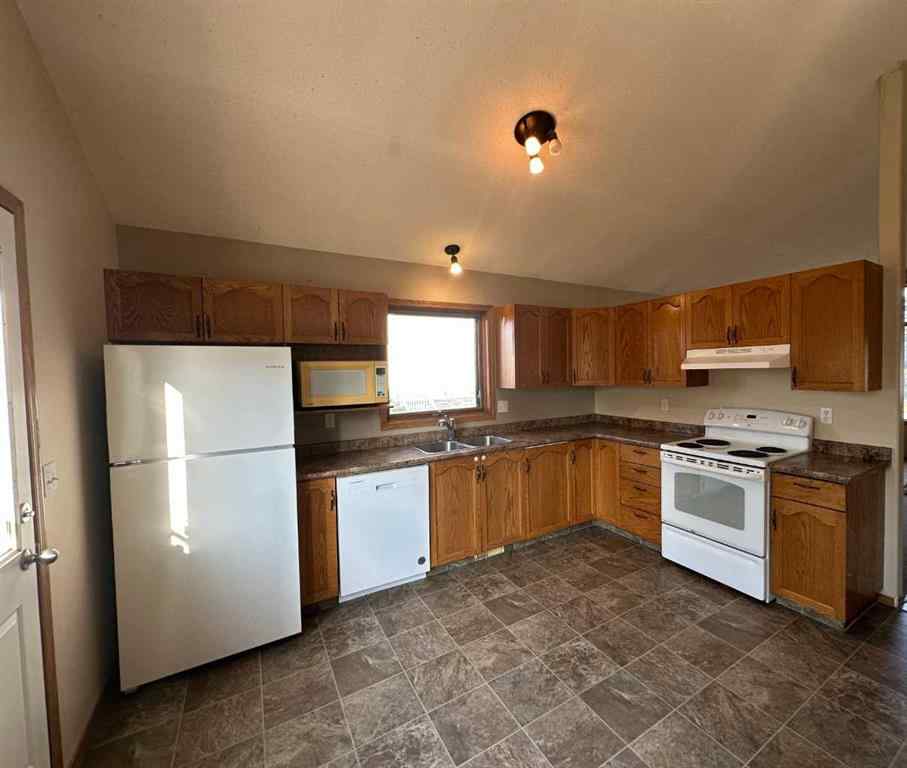 MLS® A2239988 - 9412 82 Avenue  in Patterson Place Grande Prairie, Residential