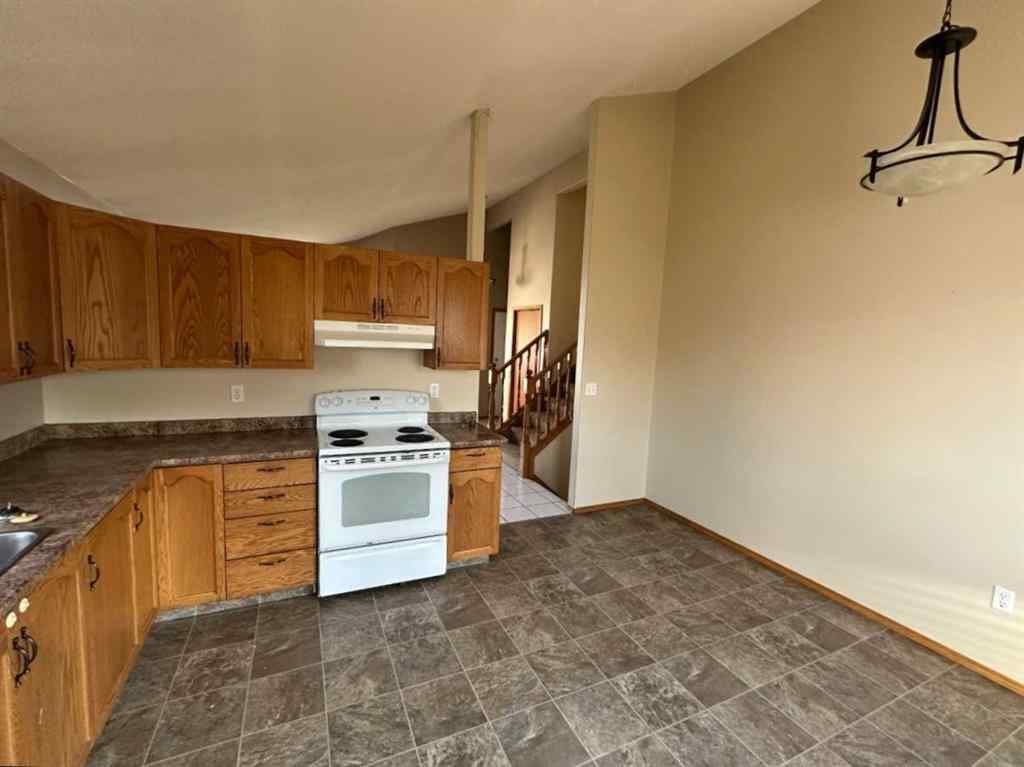 MLS® A2239988 - 9412 82 Avenue  in Patterson Place Grande Prairie, Residential