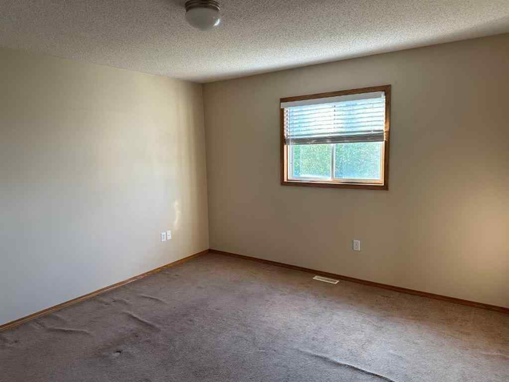 MLS® A2239988 - 9412 82 Avenue  in Patterson Place Grande Prairie, Residential