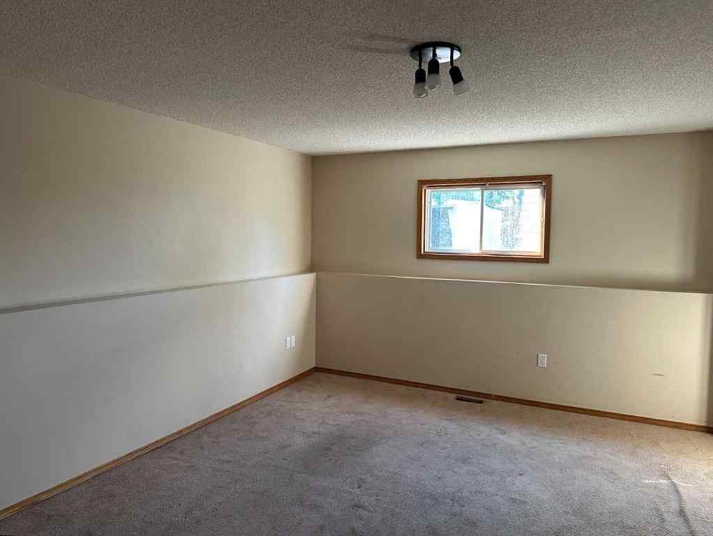 MLS® A2239988 - 9412 82 Avenue  in Patterson Place Grande Prairie, Residential