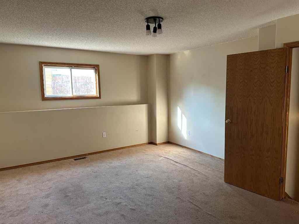 MLS® A2239988 - 9412 82 Avenue  in Patterson Place Grande Prairie, Residential