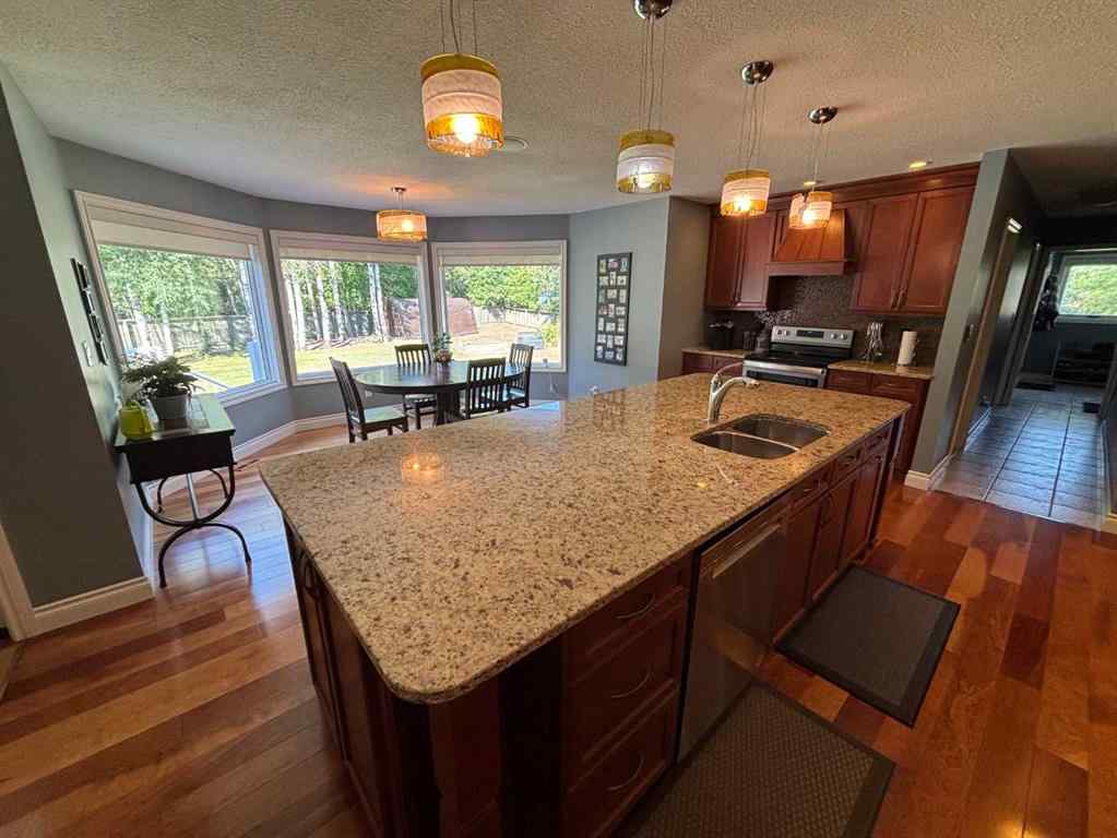 MLS® A2240074 - 10006 88 Street  in The Pines Peace River, Residential