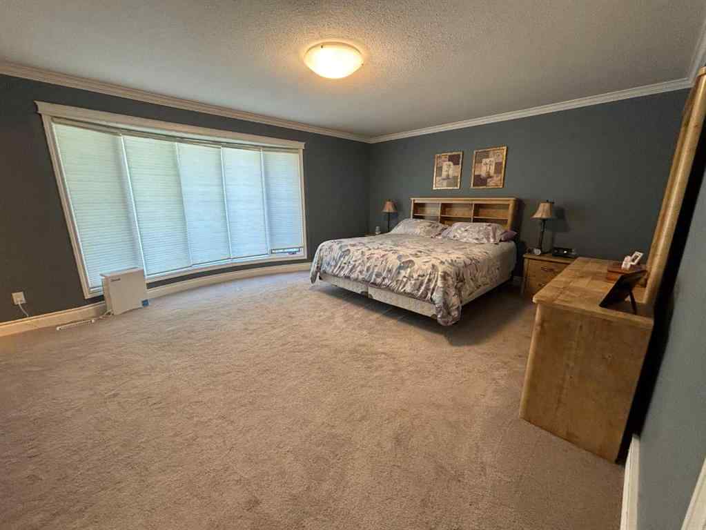 MLS® A2240074 - 10006 88 Street  in The Pines Peace River, Residential